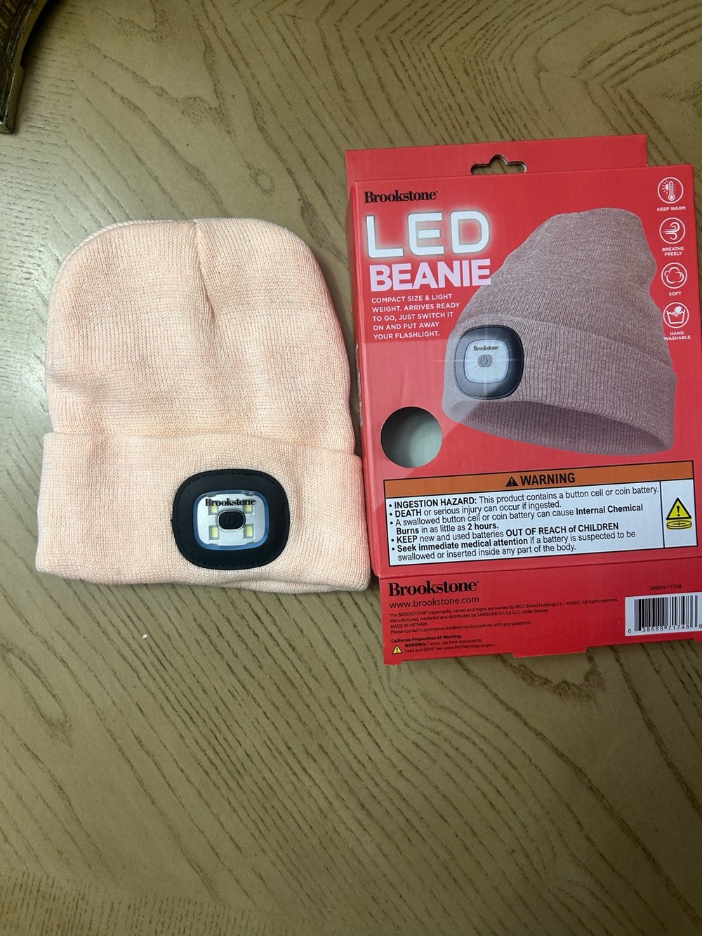 Brookstone Women’s LED Peach Beanie, One Size Fits All. New In Box